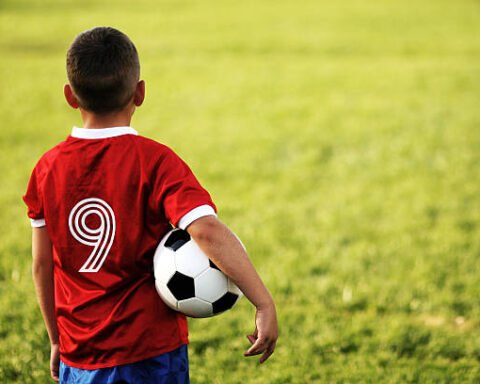 A Young Boy Dreams Of Soccer Glory.
